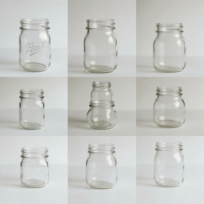 A collection of different types of glass jars, including Mason jars, wide-mouth jars, and small jars, showcasing their versatility